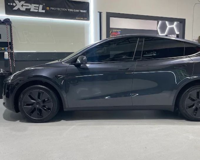 Gray Tesla Model Y protected with PPF paint protection film in Roseville