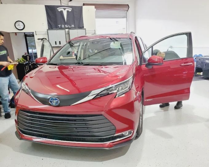 Red Toyota Sienna protected with a professional ceramic coating