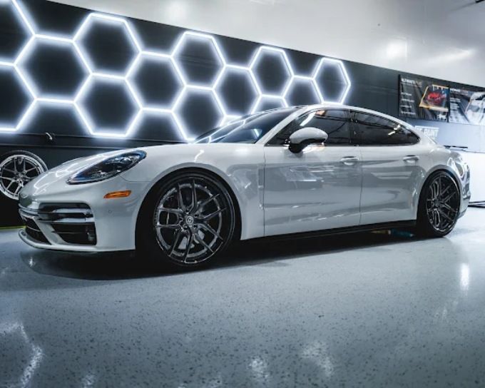 White Porsche Panamera after paint protection film (PPF) service at Wet Paint Auto Detailing