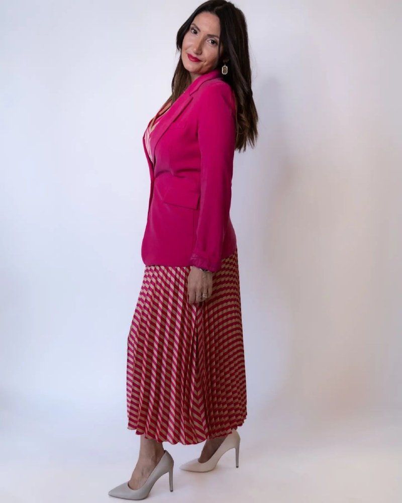 giacca in velluto fucsia con gonna lunga