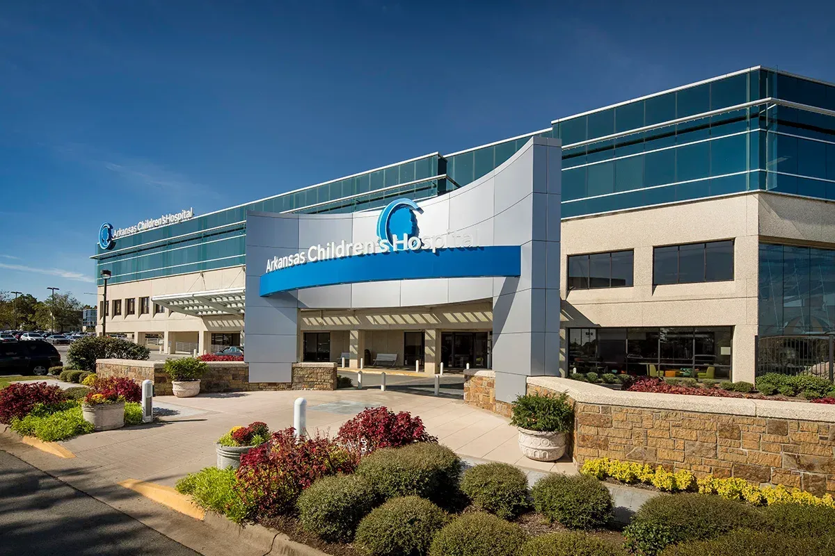 Exterior of Bon Secours St. Francis Hospital building with blue accents, sunny day.