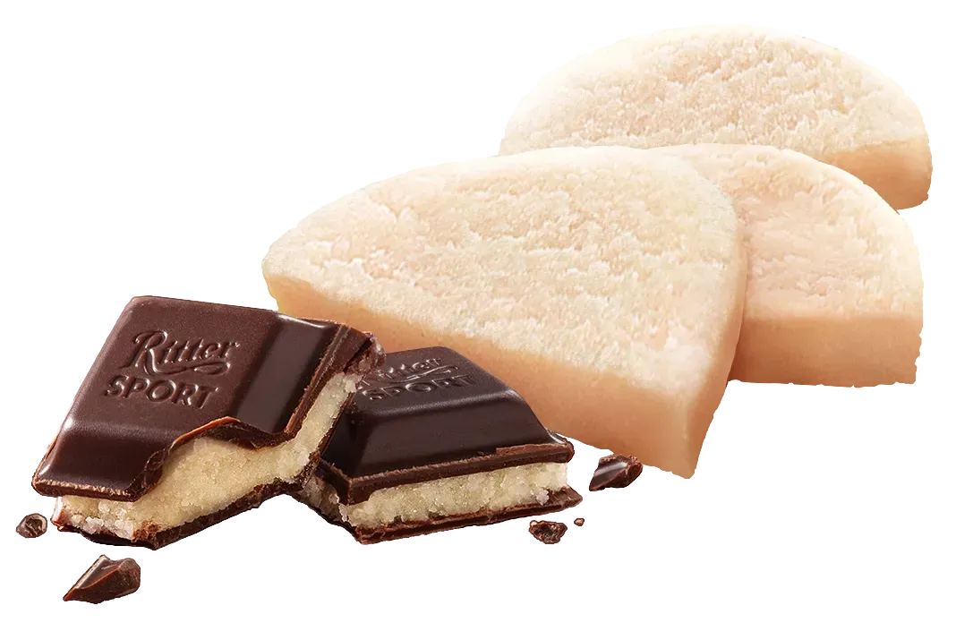 Ritter Sport chocolate bar pieces with marzipan filling, alongside several cream-colored marzipan pieces.