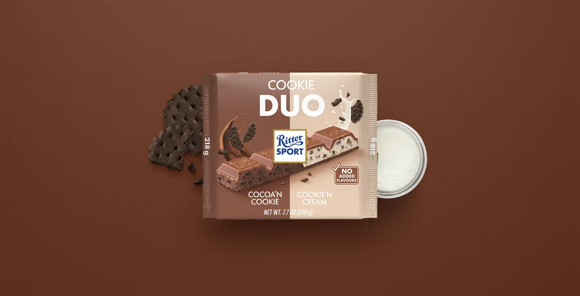 Ritter Sport chocolate bar packaging with cocoa beans, broken chocolate, and milk on a blue background.