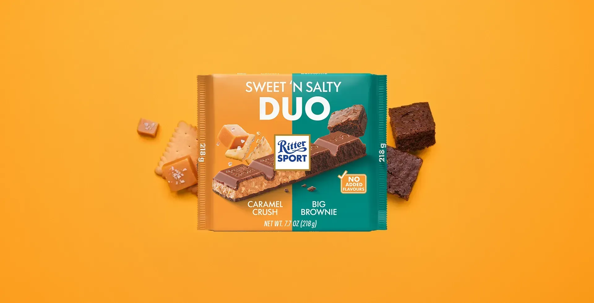 Ritter Sport chocolate bar packaging with cocoa beans, broken chocolate, and milk on a blue background.