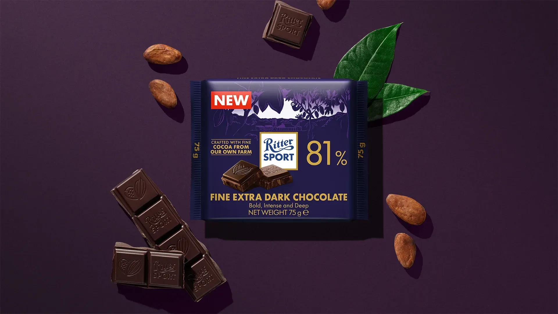 Ritter Sport chocolate bar packaging with cocoa beans, broken chocolate, and milk on a blue background.