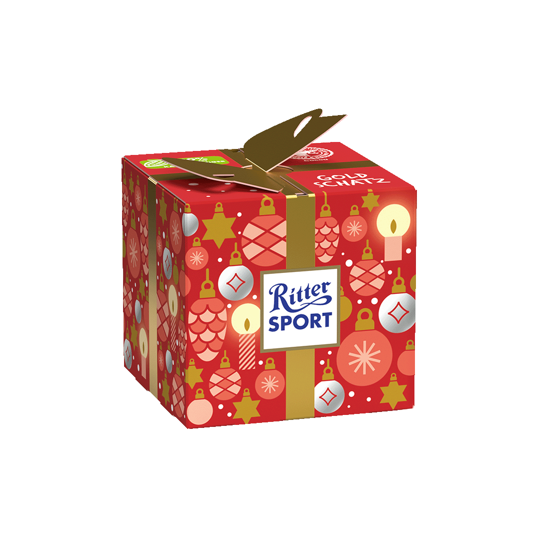 Ritter Sport Weihnachtsgeschenkbox mit roten und goldenen Ornamenten, mit einer goldenen Schleife zusammengebunden.