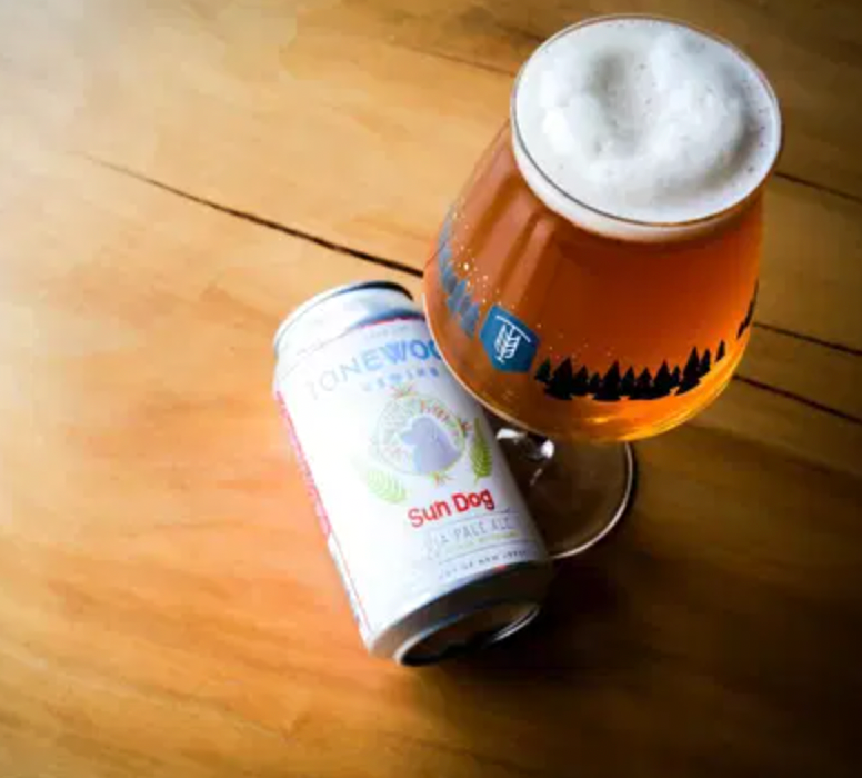 A can and glass of