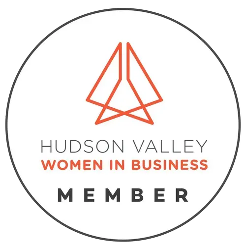 Hudson Valley Women in Business member logo with orange icon and black text in a circle