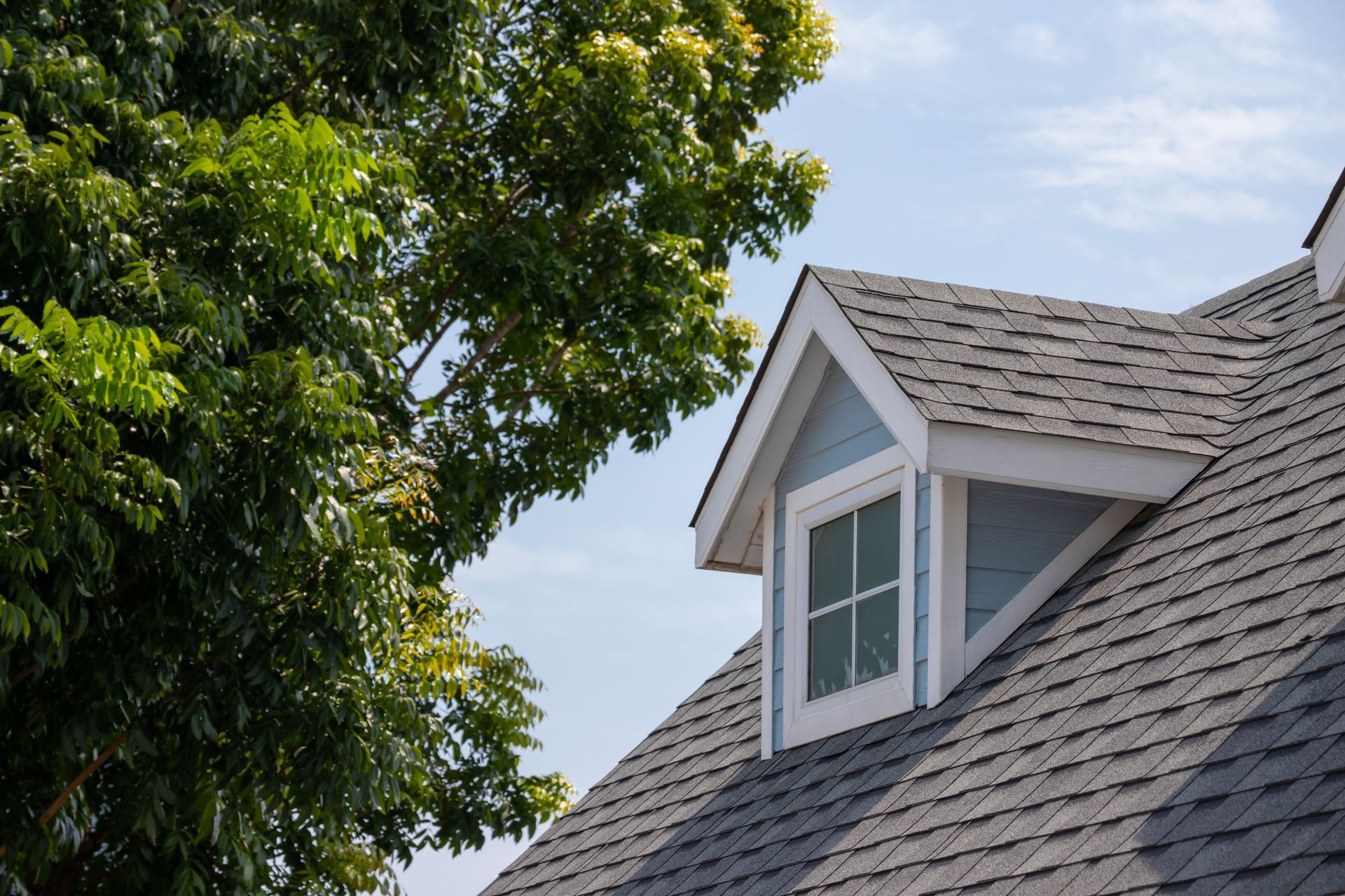 Residential roof covered with durable shingles on a home near Lincoln, NE.