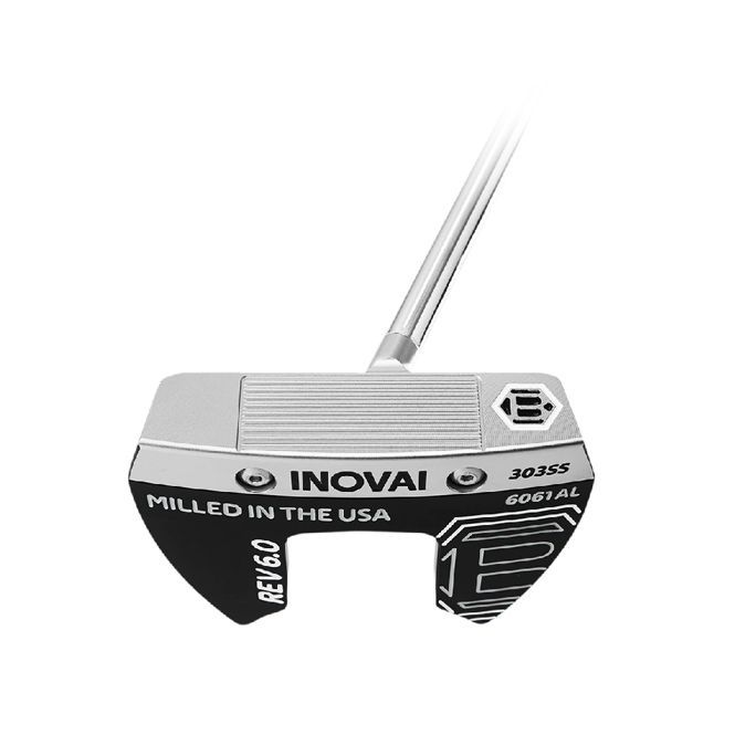 A golf putter made in the usa is sitting on a white surface.