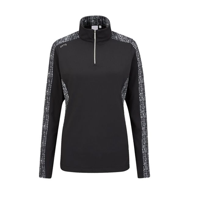A black shirt with a zipper on the front and a leopard print on the sleeves.