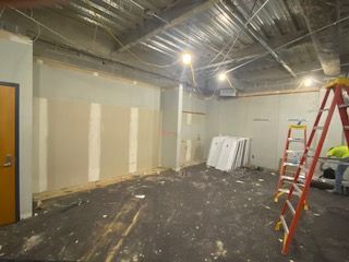 The drop ceiling has been removed by the Empire Services crew.