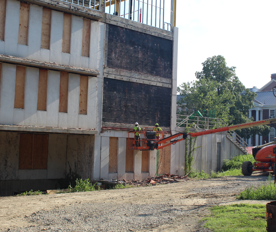 Empire Services crew on a high reach removing the exterior on the Gingrich Library at Albright College.