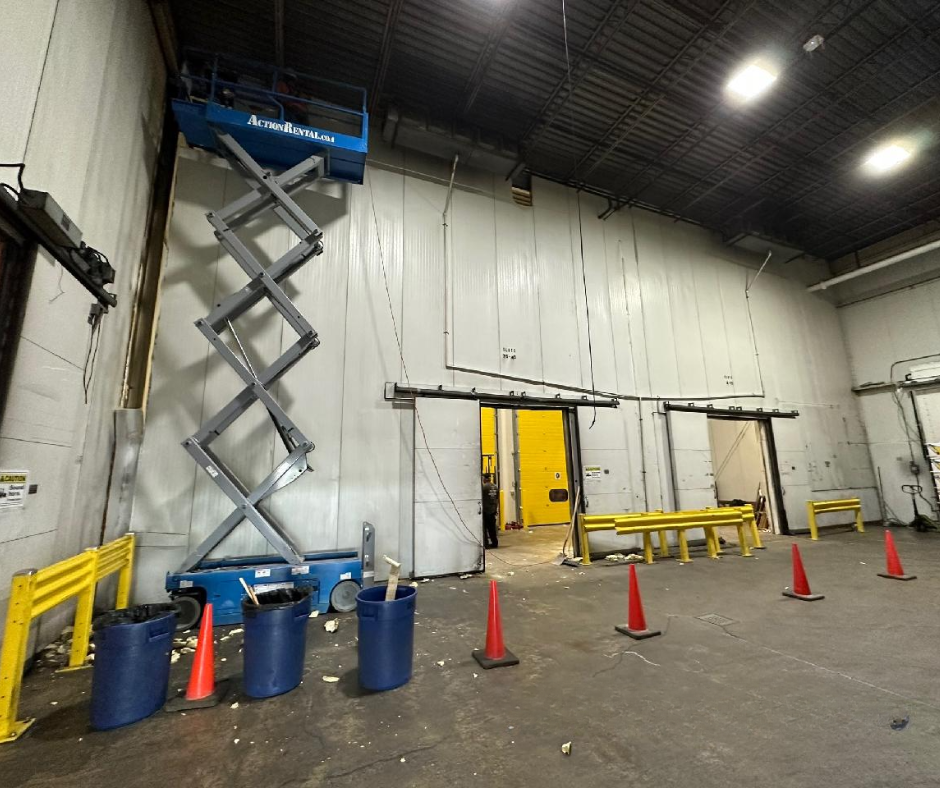 Removing panels at a fruit distribution center.