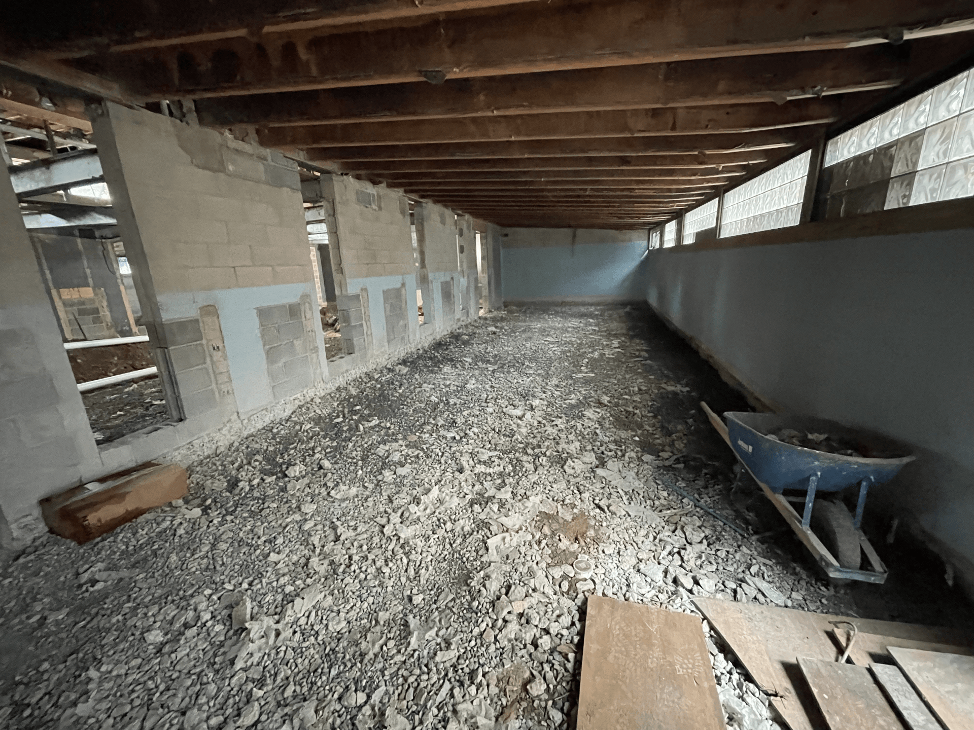 Removing the floor at Lehigh Humane Society.