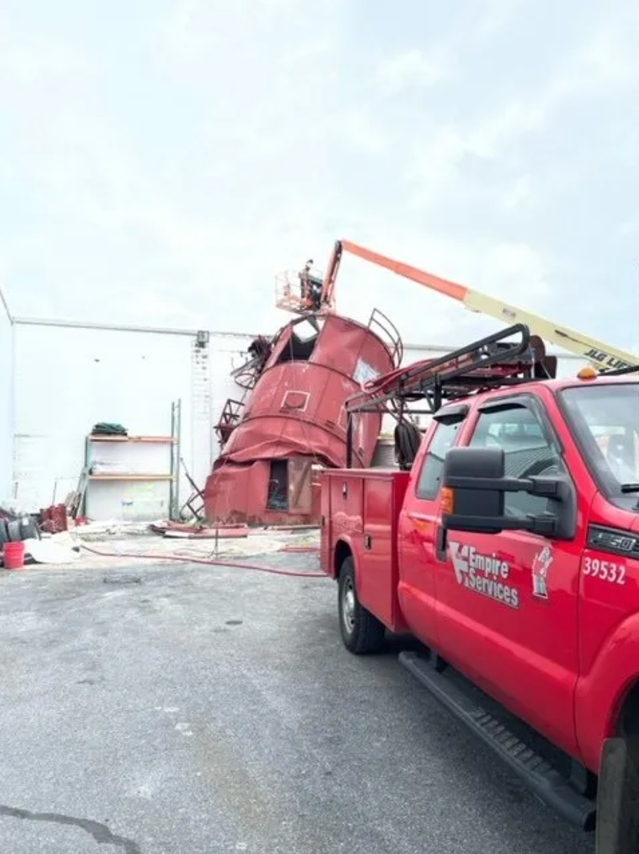 Empire Services team starts the demolition of the silo.