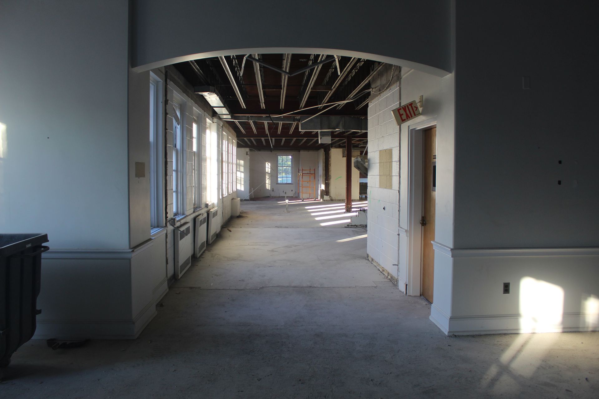 The dual doorway and kitchen are demolished.