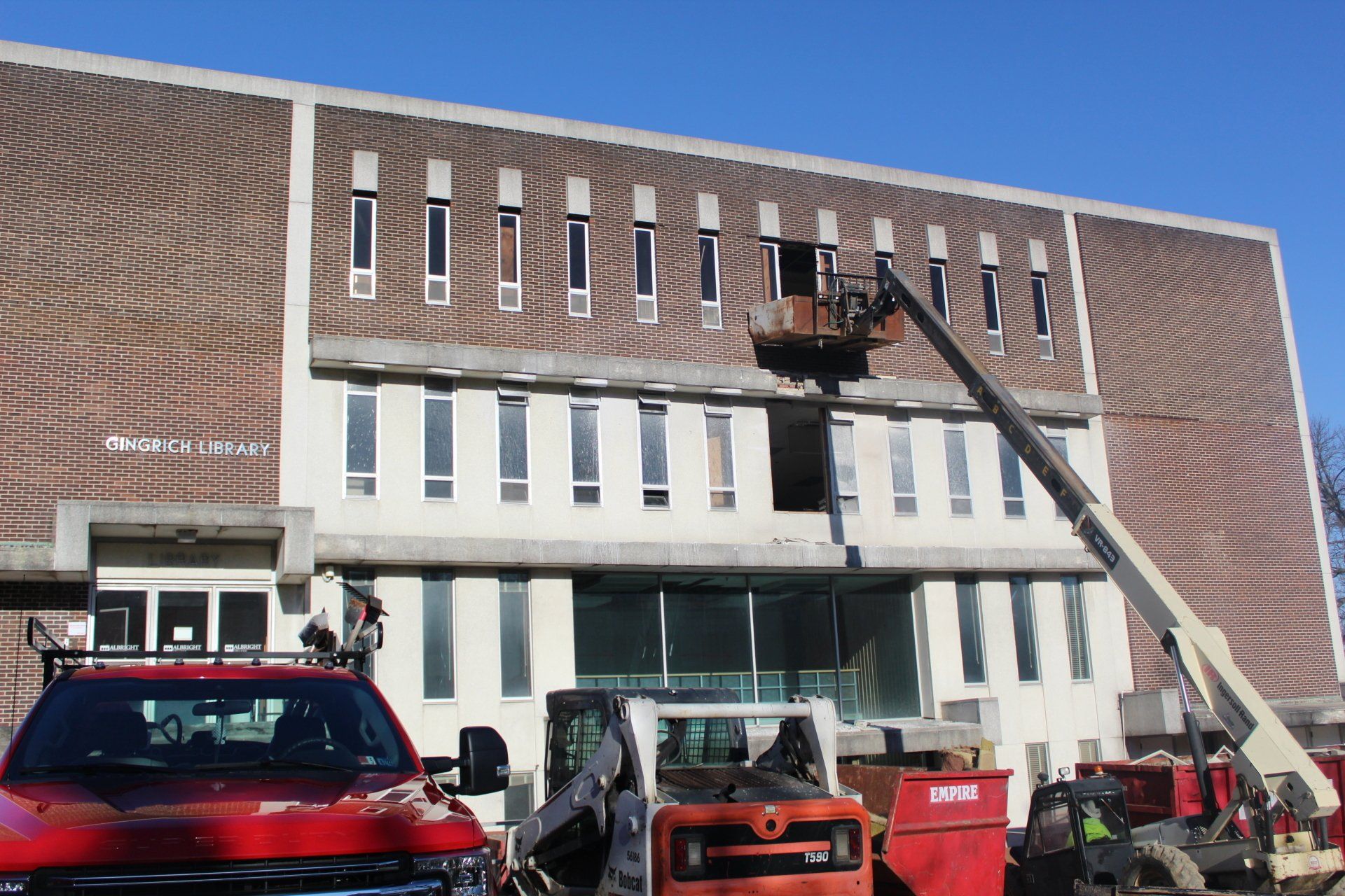 Removing debris and contents.