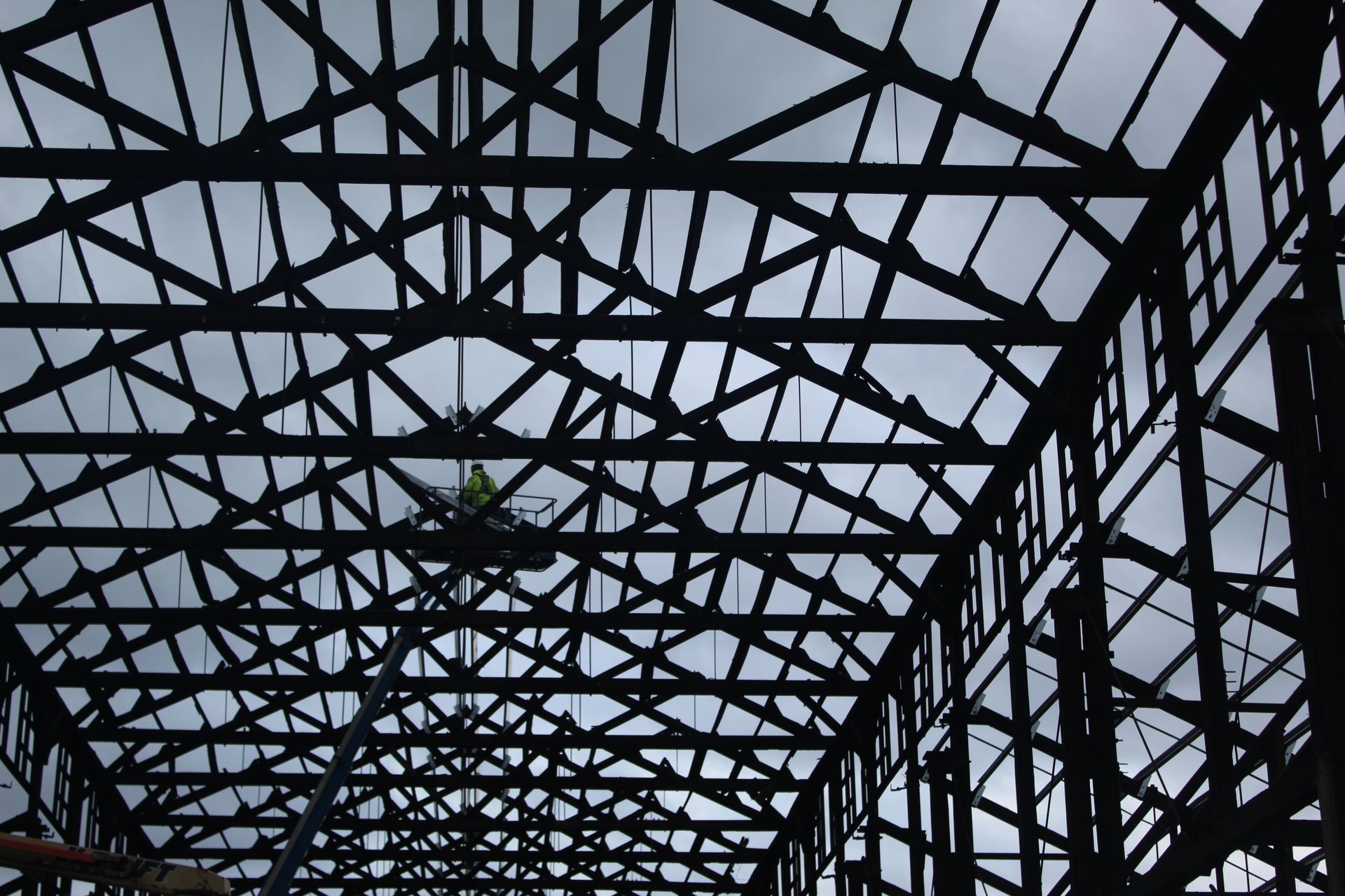 Looking up at the ceiling of a building under construction.