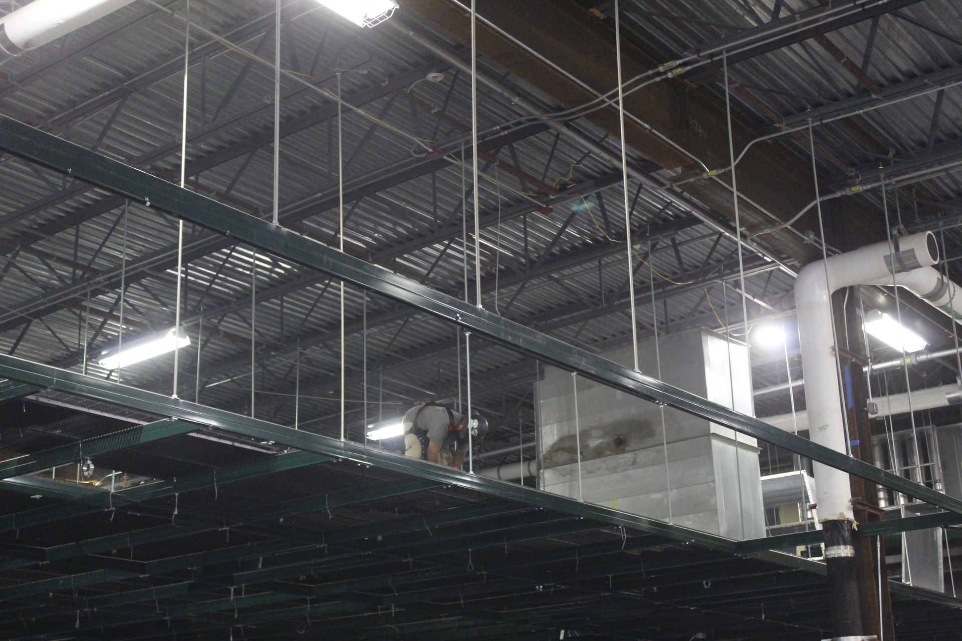 An Empire Services team member removing the mezzanine.