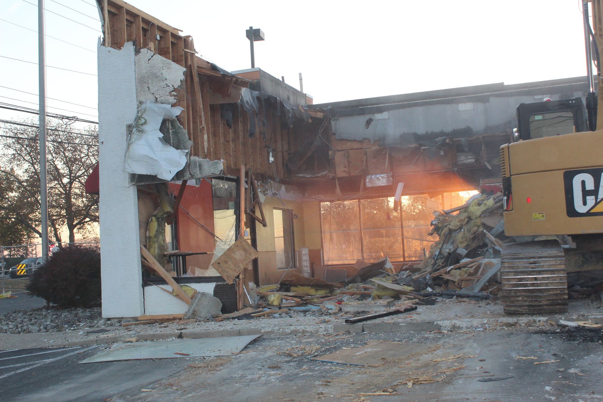 Empire Services leaves the front wall up to control fugitive emissions and manage debris. 