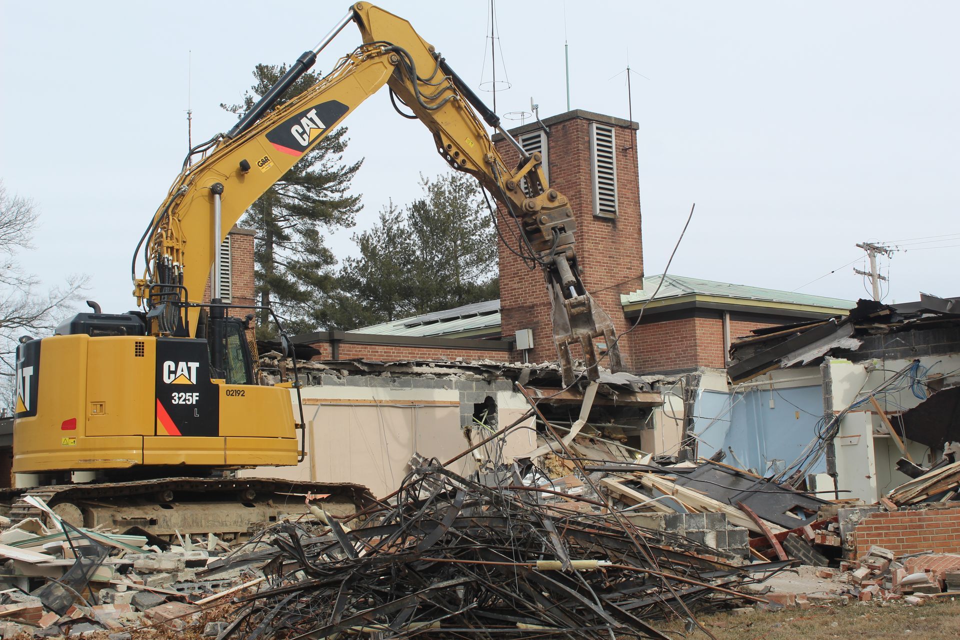 Demolishing a key section of the building.