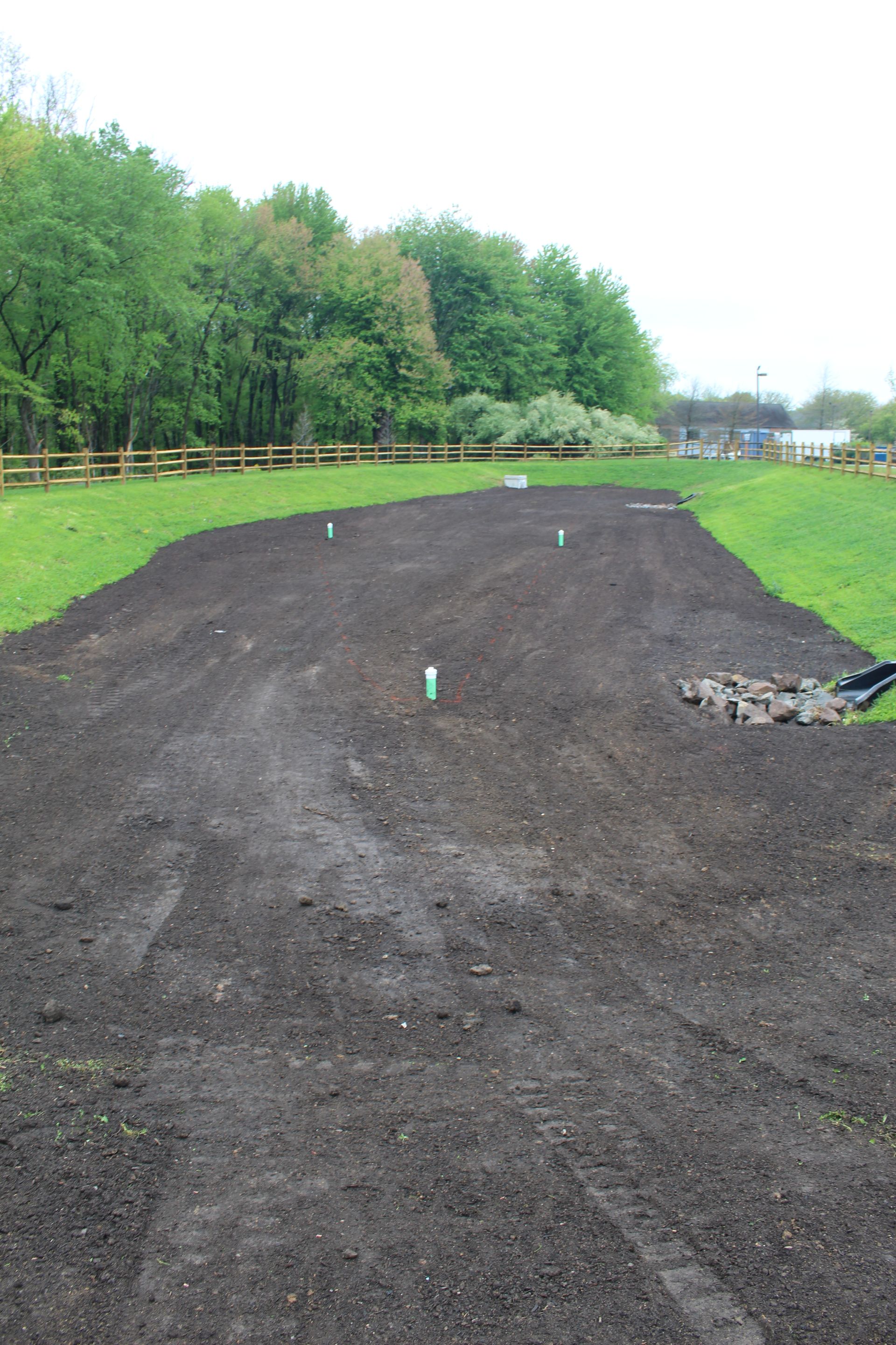 Completed detention basin by Empire Services. 
