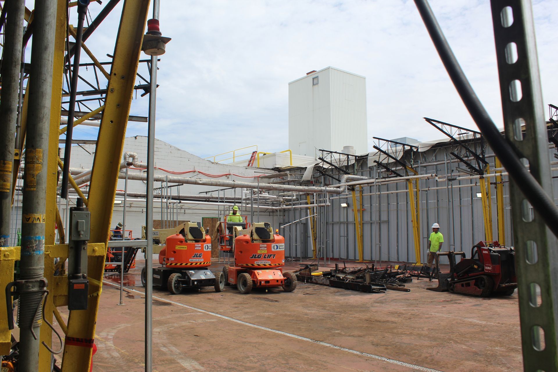 The Empire Services crew works on cutting the support structures.