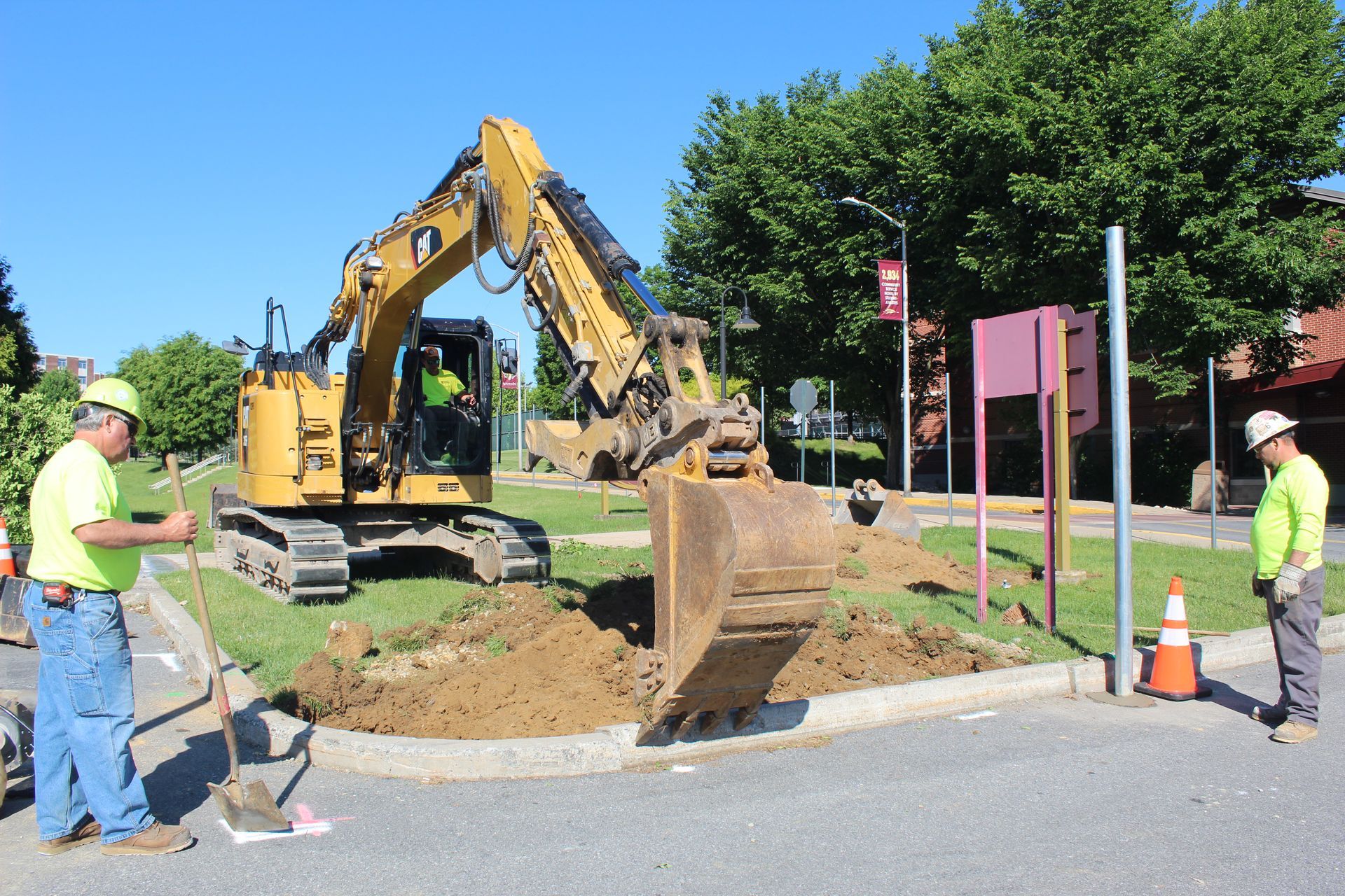 The Empire Services team excavates a new construction entrance at a local university.