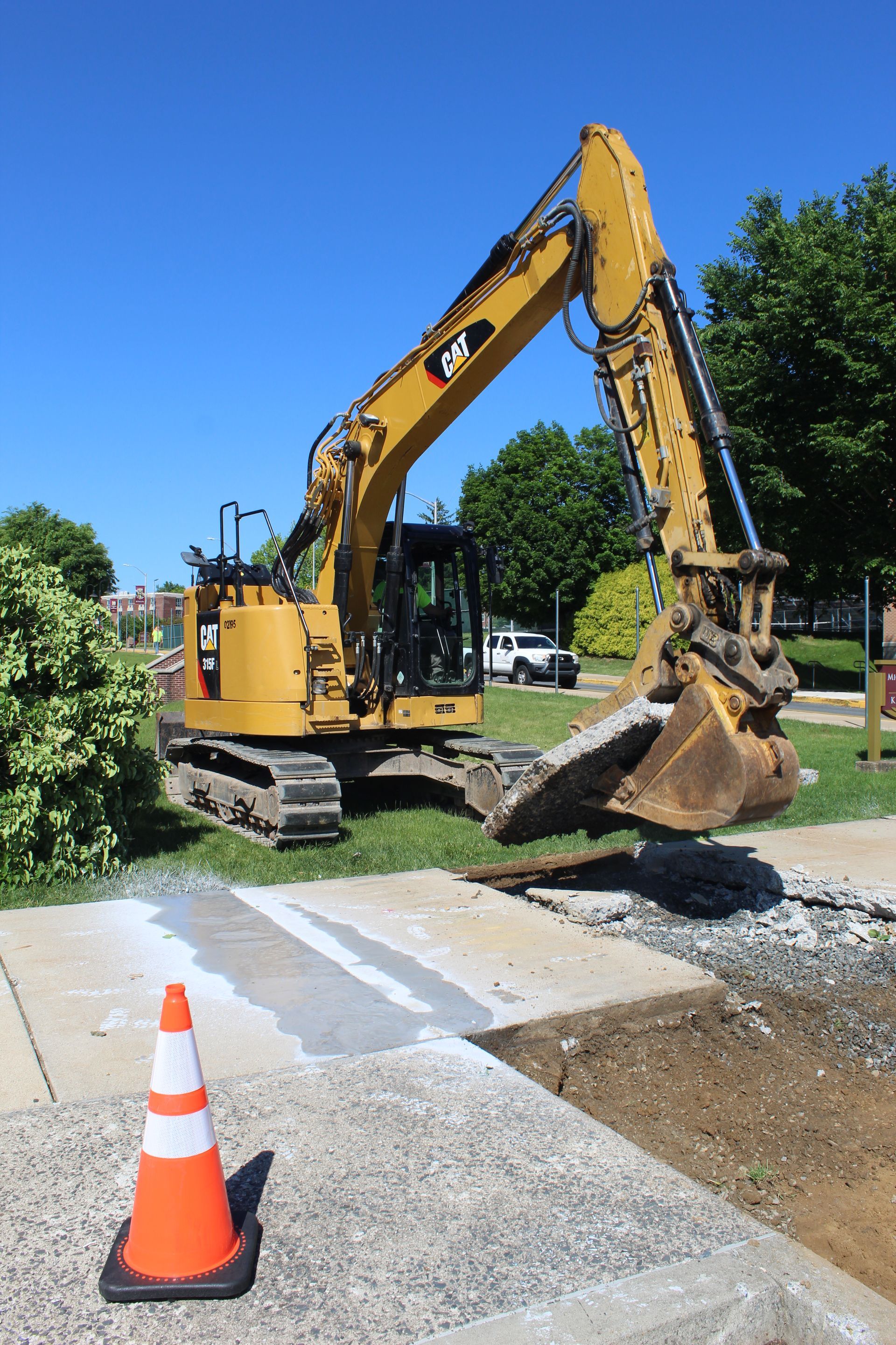 Tearing up sidewalk for a new entrance.
