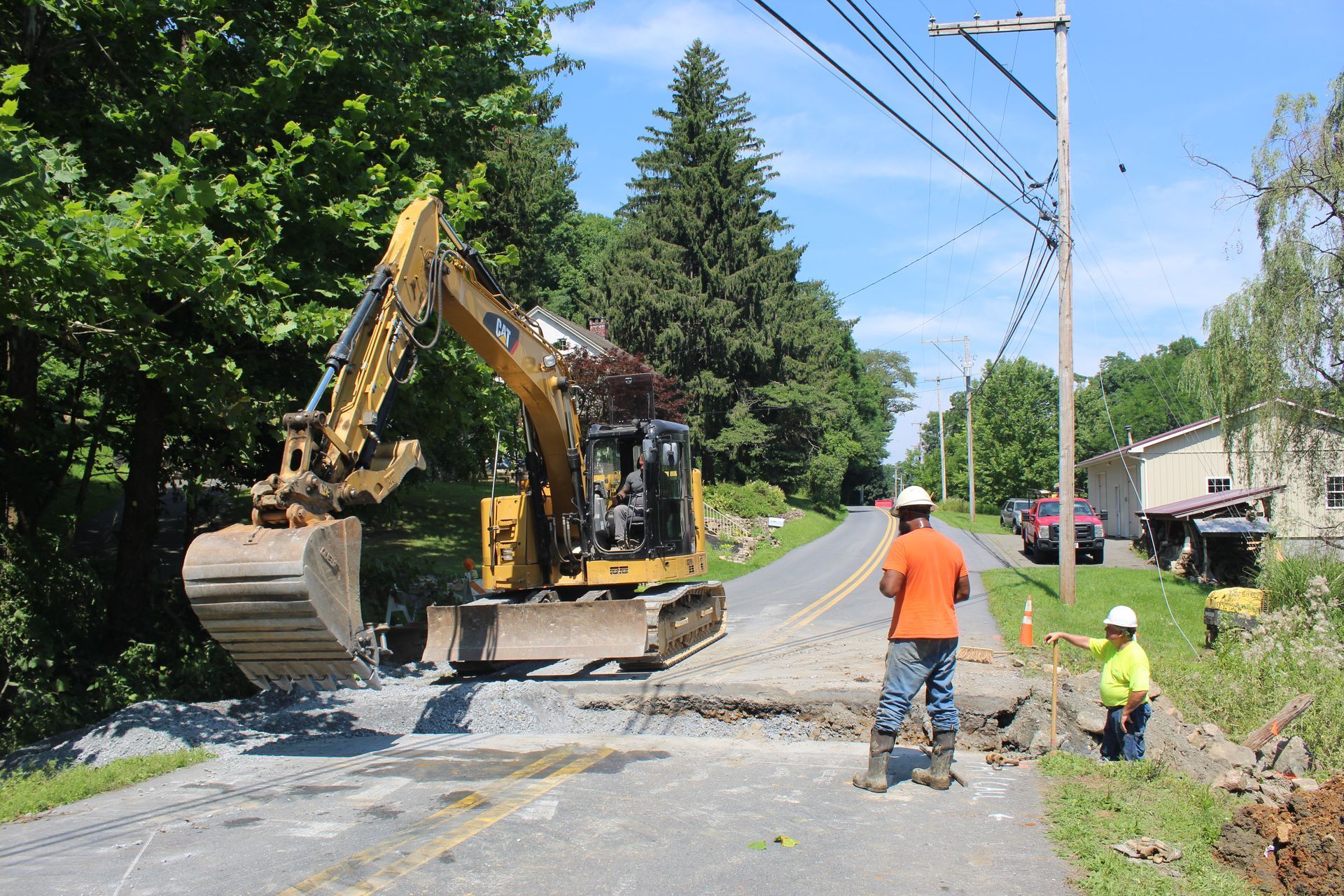 The Empire Services team works on a narrow work site.