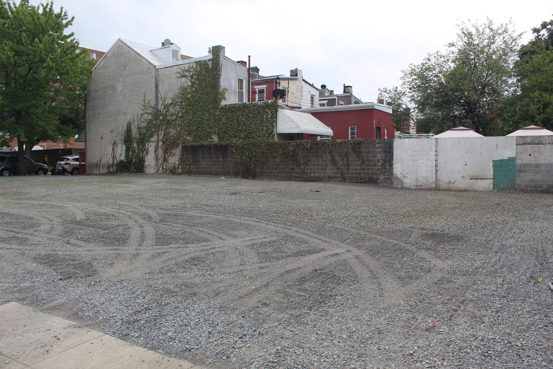 The C & D debris was cleared for a new stone parking area.