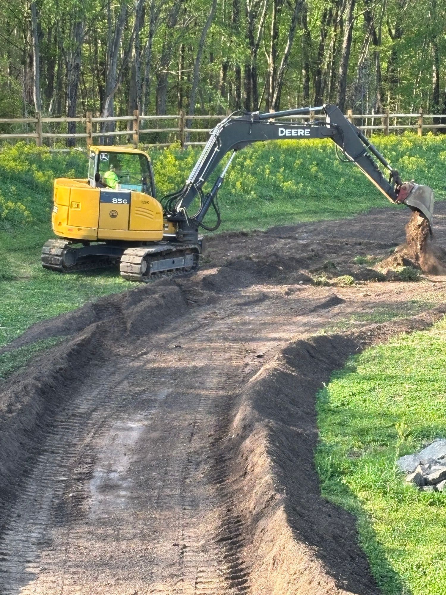 Digging up the ground for a new detention basin.