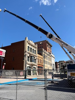 Historic building in Reading, PA that has a collapsed roof. Empire Services is setting up to start the demolition.