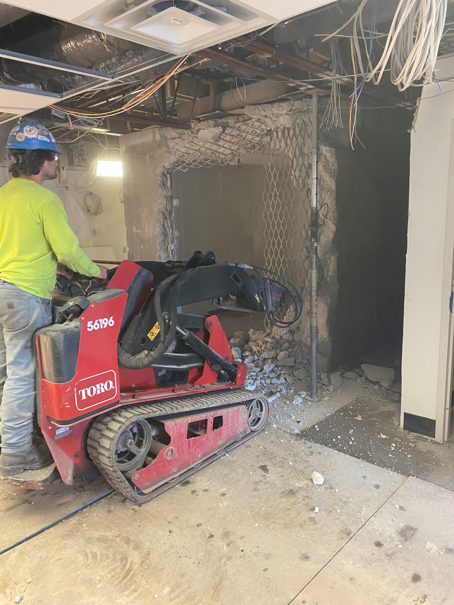 Concrete bank vault removal by Empire Services.