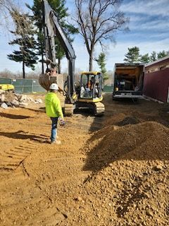 Preparing for dyanmic compaction caissons at a golf course.