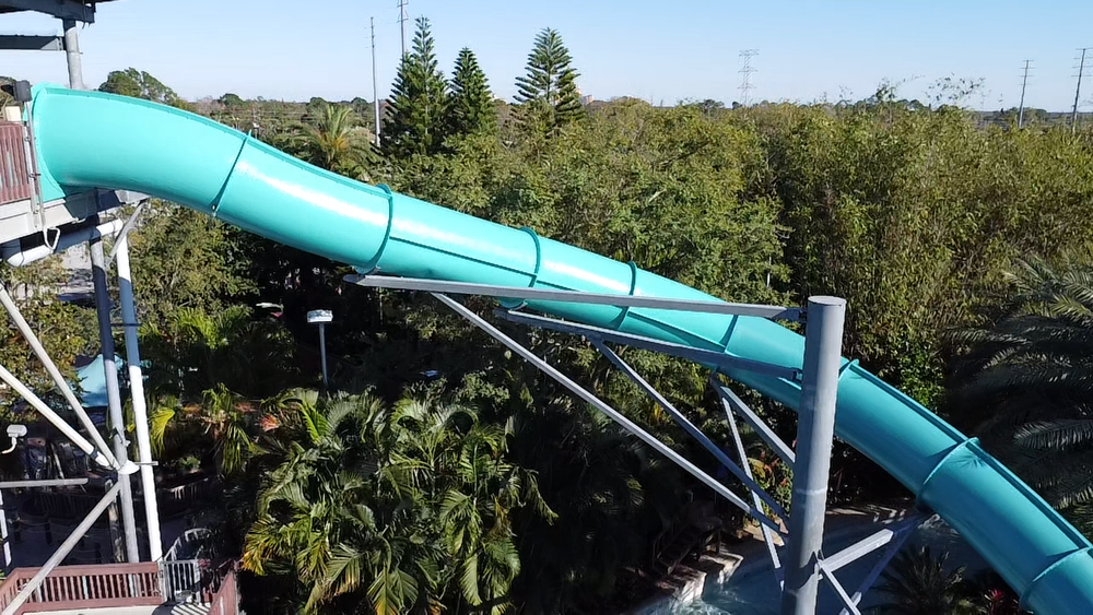 Restored waterslide surface with fresh gelcoat application