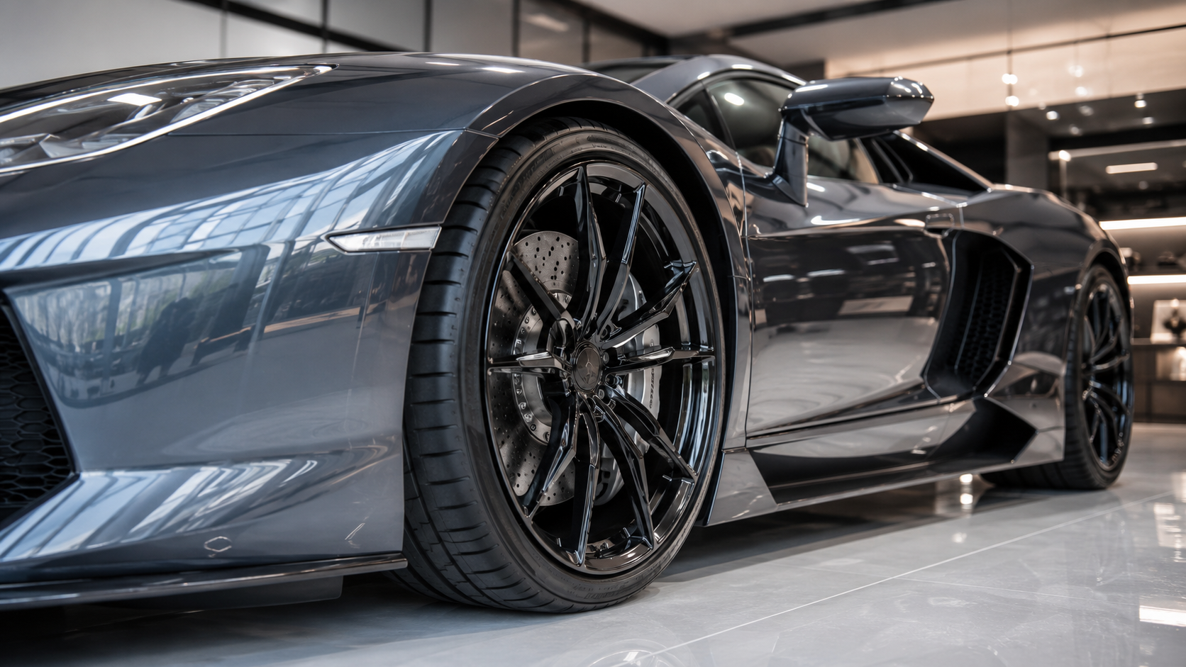 Luxury exotic car with premium performance tire and wheel