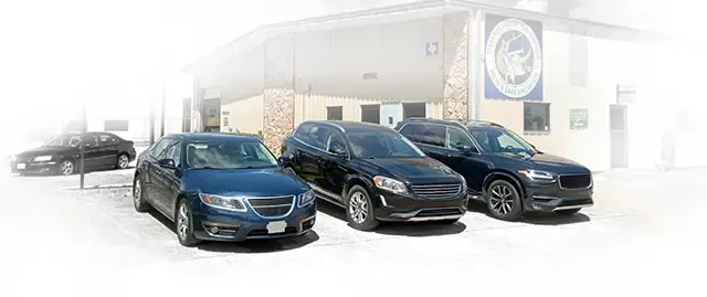 Vehicles in front of our auto repair shop | Texas Automotive Performance