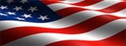 Waving American flag with red and white stripes and blue field of stars