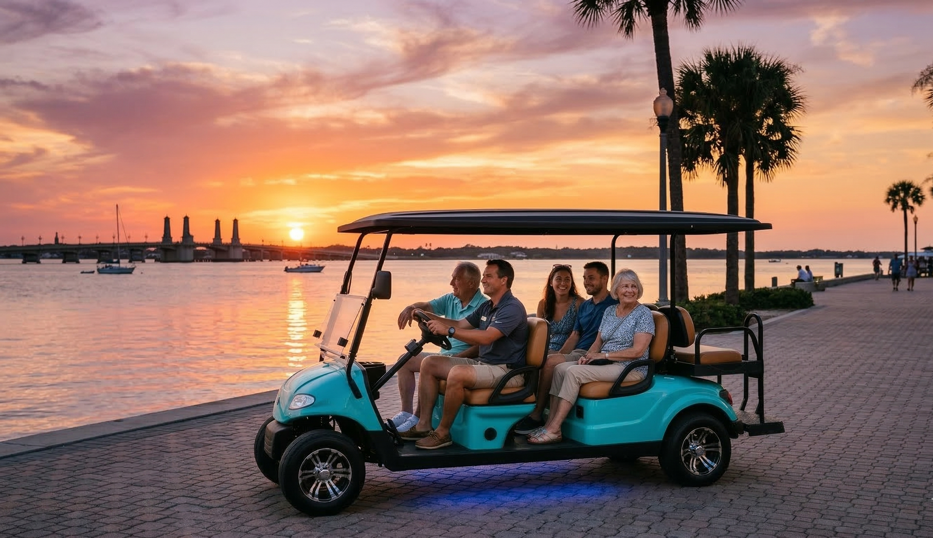 A teal golf cart with people inside, illuminated by purple lights, traveling on a street at night.