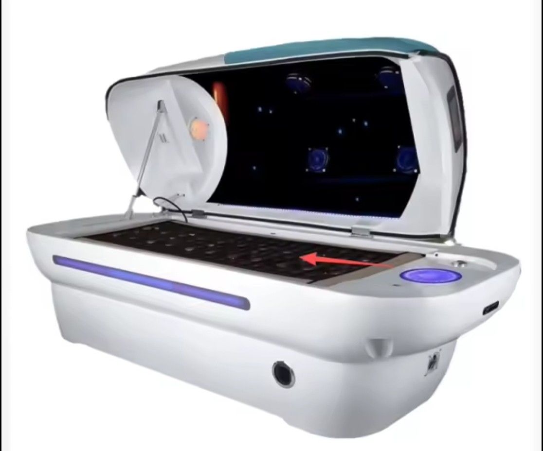 Futuristic white medical scanner with open chamber and glowing blue display panel