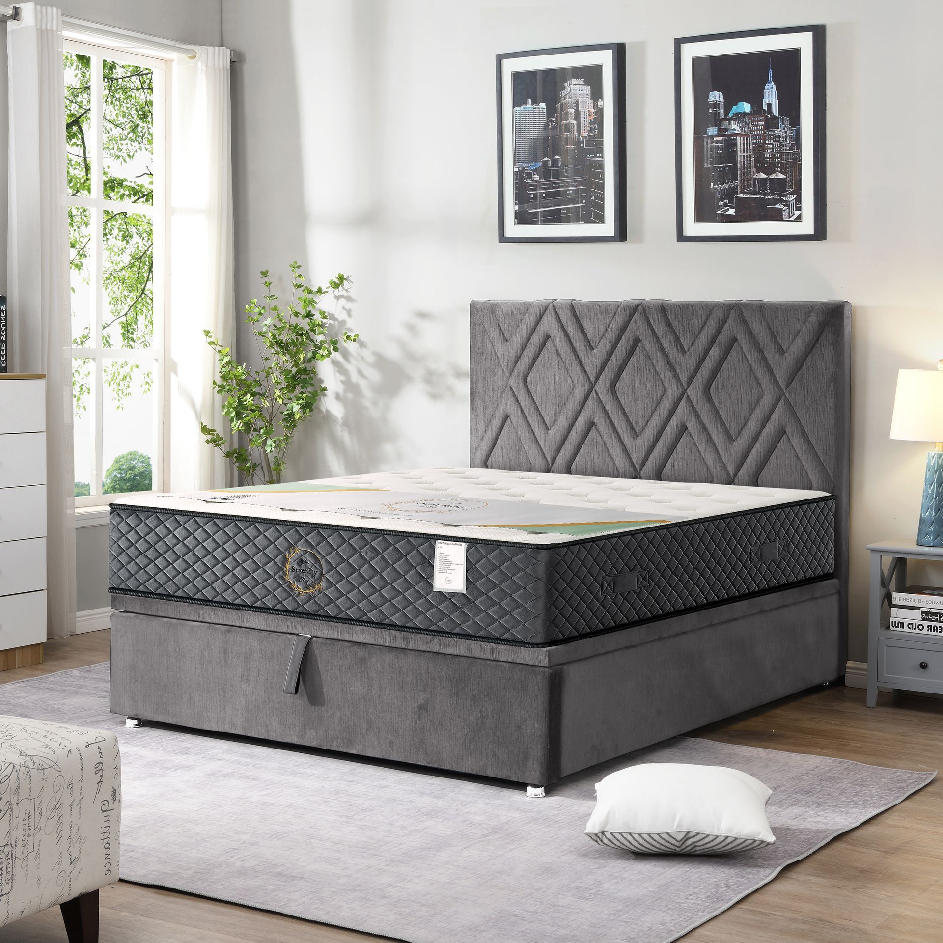 White tufted mattress with dark gray sides and a “Free Delivery” label above it