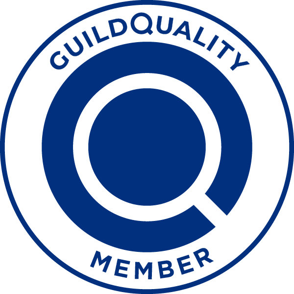 Guild Quality Member badge with blue circular Q logo on a white background