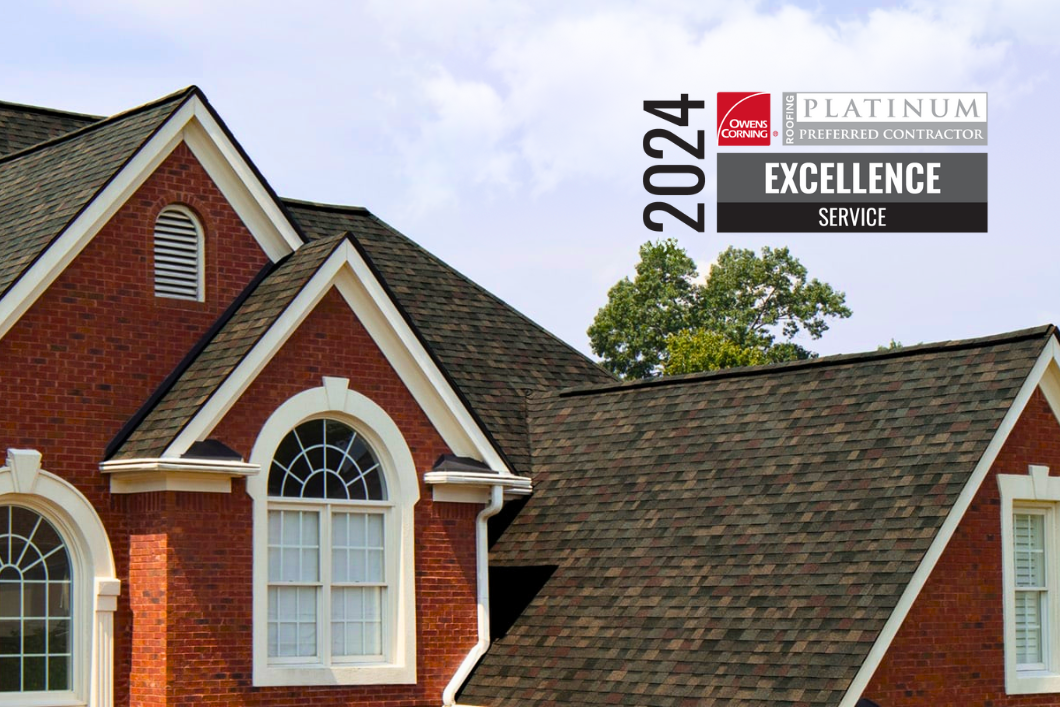 Red-brick house roof with 2024 Platinum Excellence award badge in the upper right