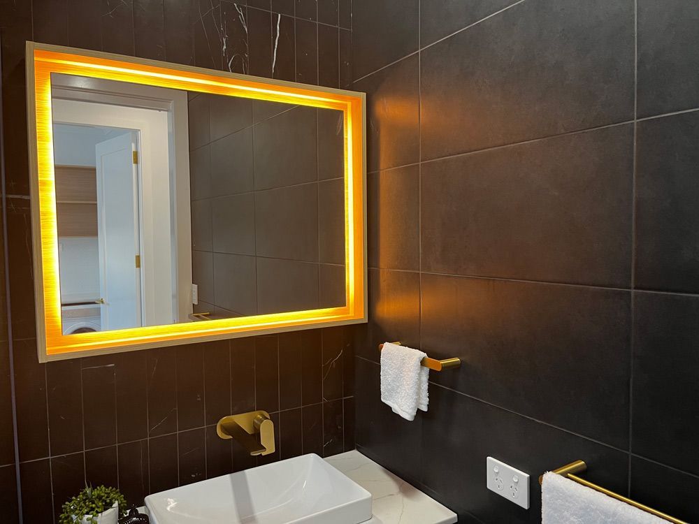 Big Mirrors With Lightings In The Bathroom — Rohr Electrical In Dubbo, NSW