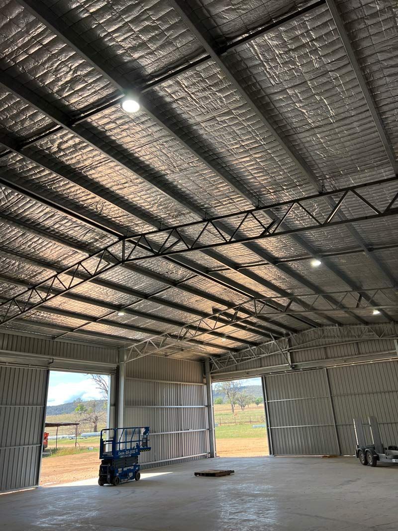 Inside Lights On The Shed With Roof Insulation — Rohr Electrical in Dubbo, NSW