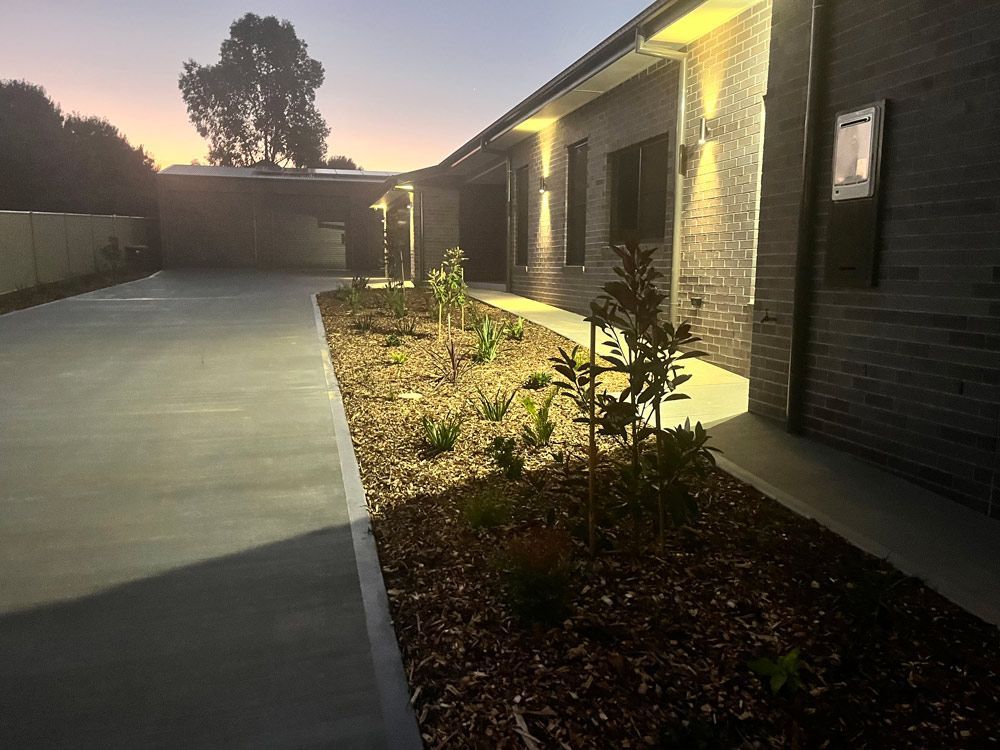 Outdoor Lights On A House At Night — Rohr Electrical in Dubbo, NSW
