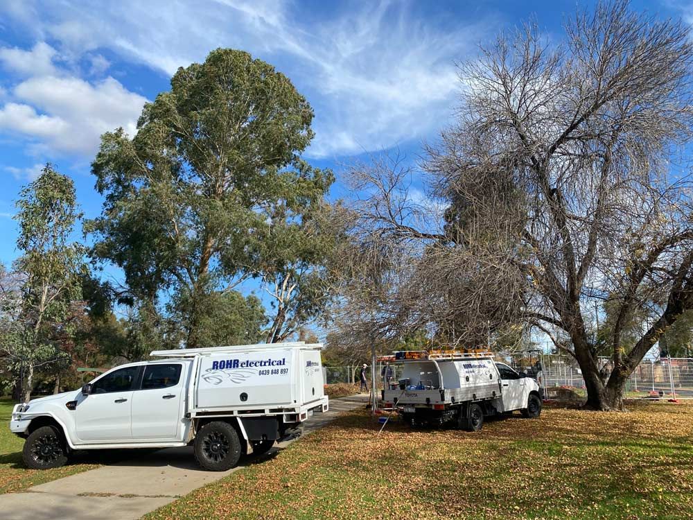 Two White Pick-Up Service Car — Rohr Electrical in Dubbo, NSW