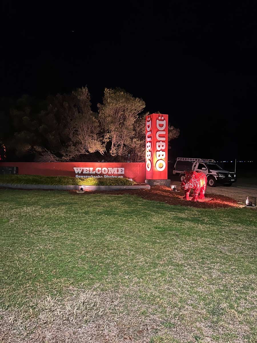 Welcome To Dubbo With The Pick-Up Vehicle Background — Rohr Electrical in Dubbo, NSW